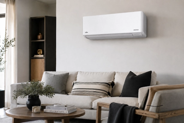Fujitsu wall mounted air conditioning unit in a living room