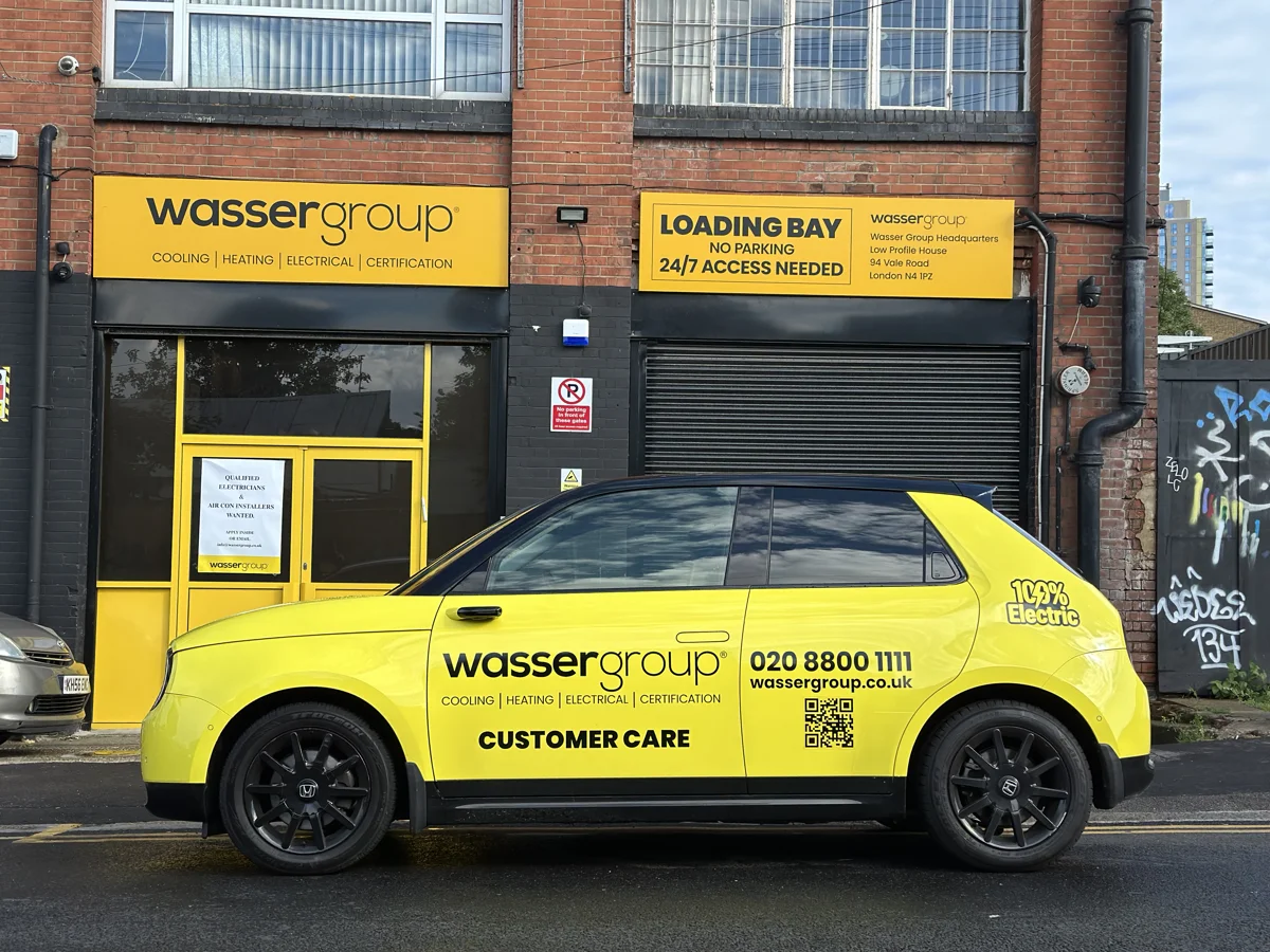 Wasser Group headquarters with the yellow customer care car outside